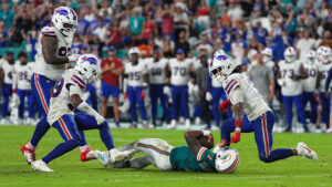 Miami Dolphins quarterback Tua Tagovailoa hits head on the ground after being tackled by Buffalo Bills safety Damar Hamlin