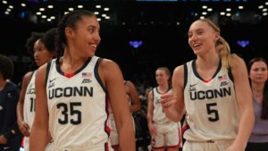 UConn guards Azzi Fudd and Paige Bueckers celebrate after the game against the Louisville Cardinals at Barclays Center.