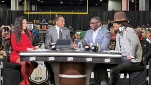 The hosts of ESPN First Take, Molly Qerim, Stephen A. Smith, Shannon Sharpe and Cam Newton, at the CFP Fan Central