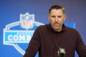 Washington Commanders general manager Adam Peters speaks at the NFL Scouting Combine at the Indiana Convention Center