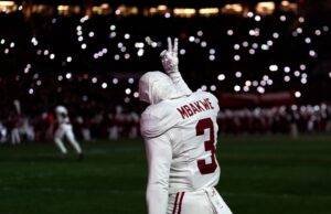 Alabama's Jaylen Mbakwe (3) signals after praying in the end zone before the College Football Playoff game between the
