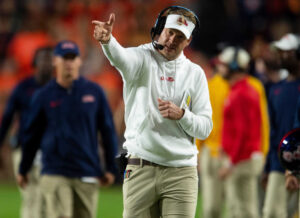 Mississippi Rebels head coach Lane Kiffin celebrates a pass interference call as Auburn Tigers take on Mississippi Rebels at