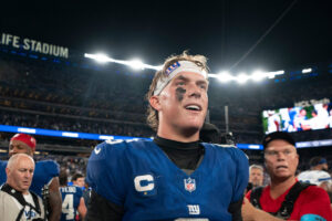 New York Giants quarterback Jaxson Dart (6) walks off the field following a 28-20 victory during a week one opening game between