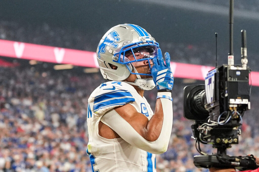 Detroit Lions wide receiver Amon-Ra St. Brown (14) celebrates a touchdown against Buffalo Bills during the second half at