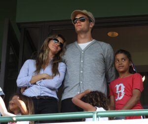 2012: Tom Brady and his wife Gisele Bundchen look out over Fenway during the 7th inning stretch.