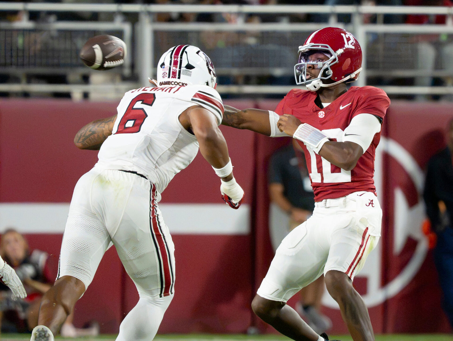 Sep 26, 2026; Tuscaloosa, AL, USA;  Alabama quarterback Keelon Russell (12) makes a sidearm throw around South Carolina edge