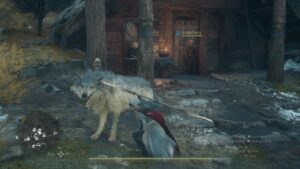 The Arisen petting Freki the Direwolf in Dragon's Dogma 2