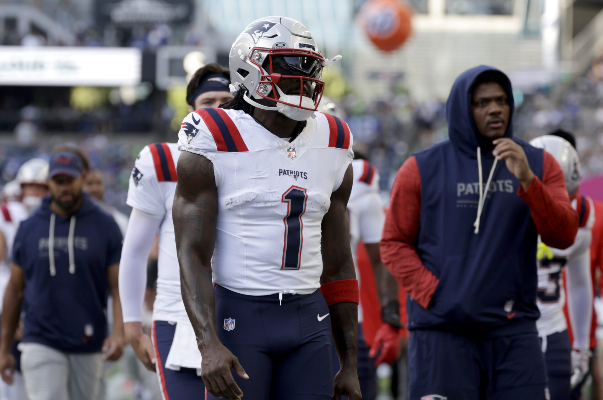 Sep 9, 2026; Seattle, Washington, USA; New England Patriots wide receiver A.J. Brown (1) leaves the field after warm ups with linebacker Namdi Obiazor (48) before a game against the Seattle Seahawks at Lumen Field. Mandatory