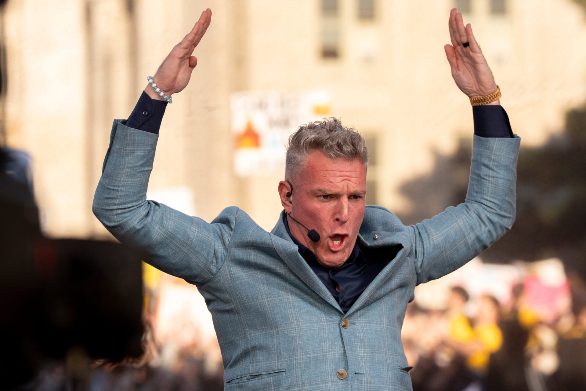Pat McAfee joins Iowa fans in the I-O-W-A chant Oct. 3, 2026 during a live broadcast of ESPN’s “College GameDay” in downtown