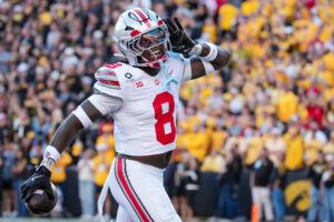 Ohio State Buckeyes safety Jaylen McClain (8) celebrates an interception during the NCAA football game against the Iowa Hawkeyes